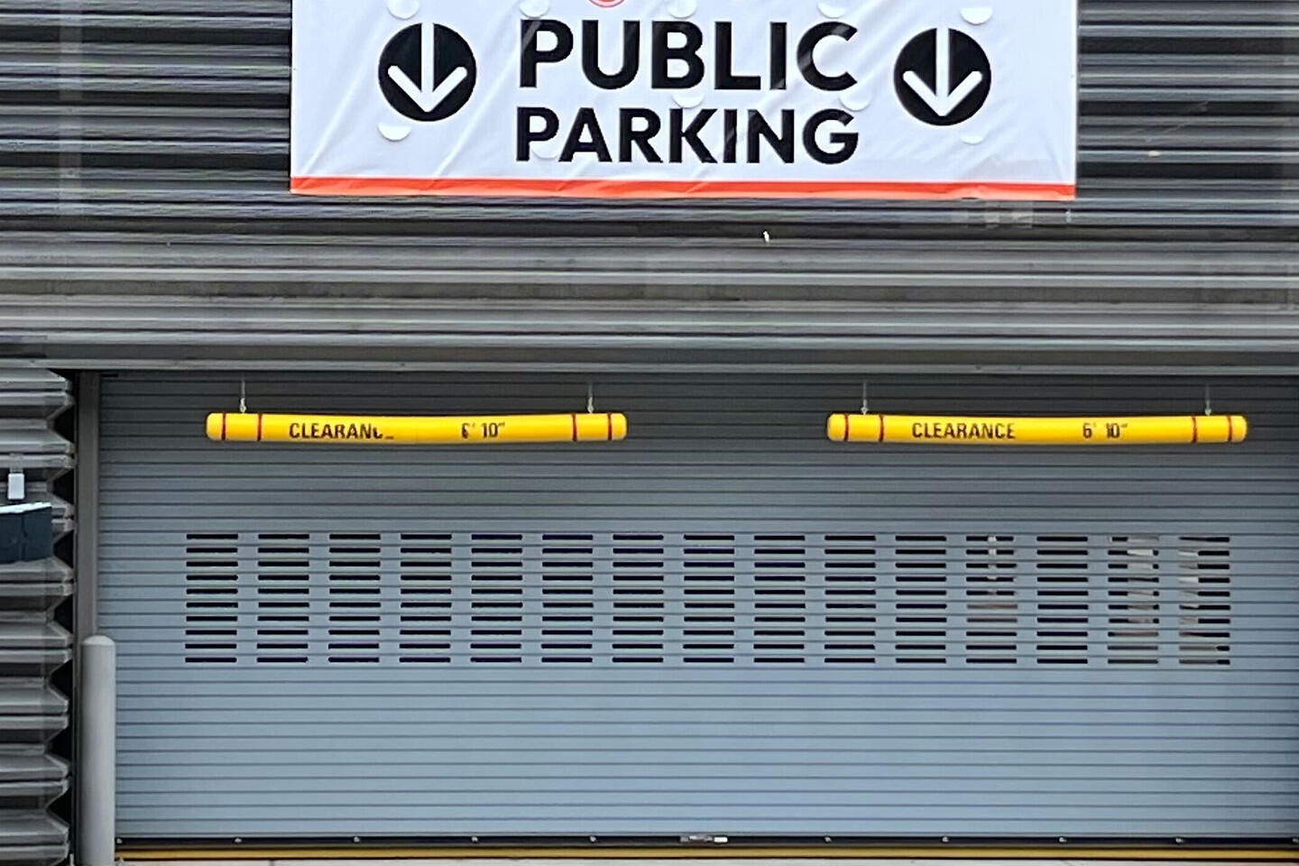 Aviator Parking garage entrance with Public Parking roll-up door